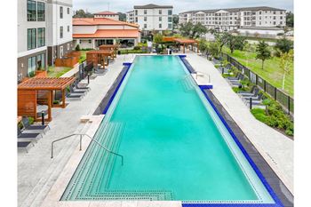 Luxe infinity-edge, olympic-size swimming pool